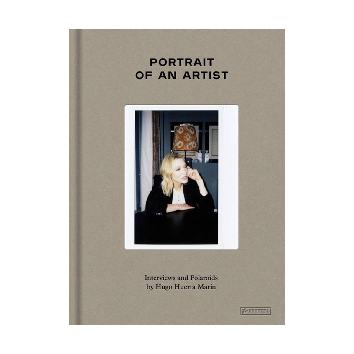 Book titled 'Portrait of an Artist' with a photo of a woman on the cover