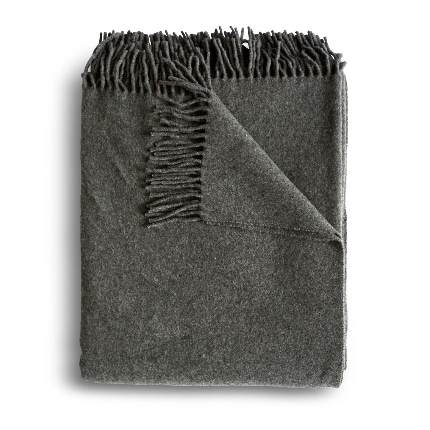 A soft dark gray cashmere throw blanket with textured surface and fringed edges in granite color