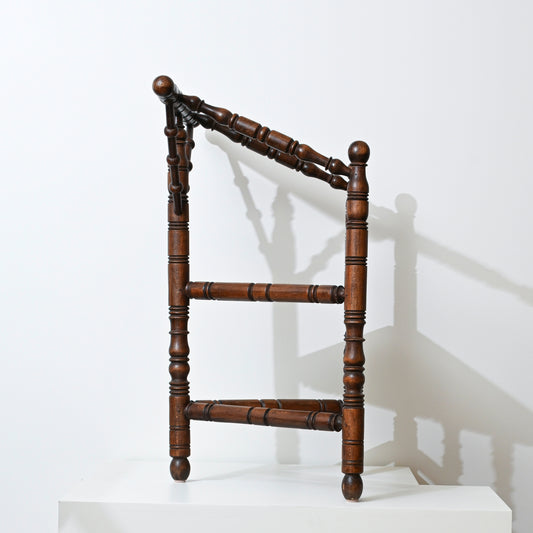 Antique dark wood ladder-back early 20th century swedish art deco armchair with turned spindles and ball finials