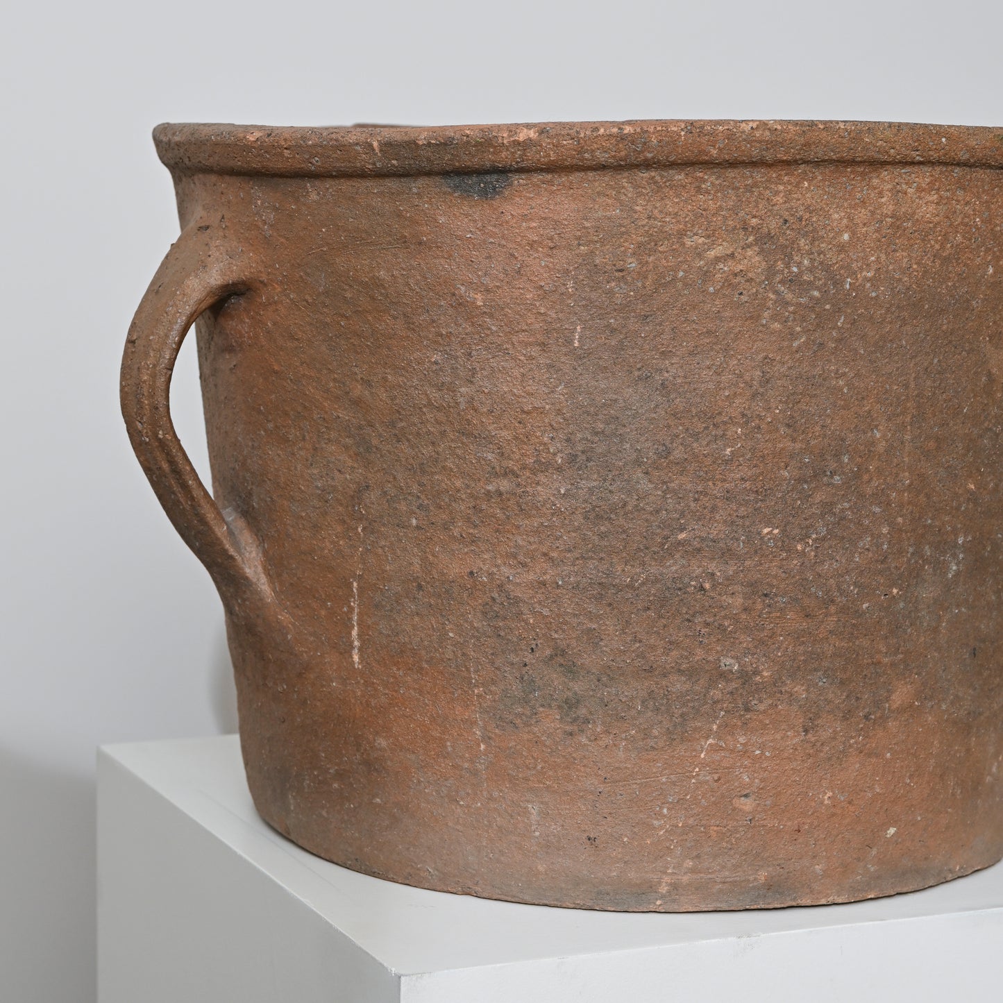 Rustic 19th century french terracotta vessel with single handle and weathered earthy brown surface