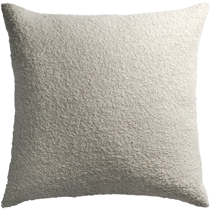 Cream-colored attenborough pillow with zip detail featuring a plush fuzzy textured throw pillow surface