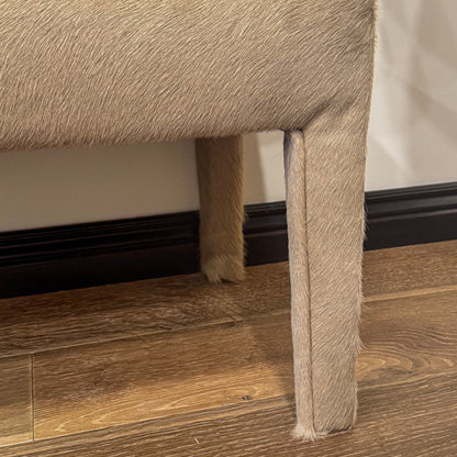 Beige cowhide upholstered custom order charlie bench with sleek modern design perfect for stylish seating