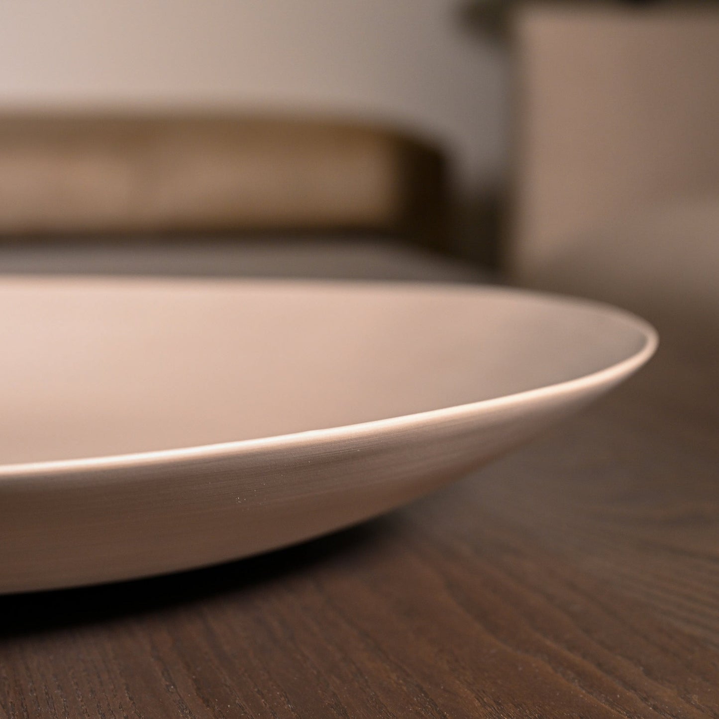 Minimalist shell plate large light brown ceramic with smooth glossy finish and gently curved rim for elegant serving