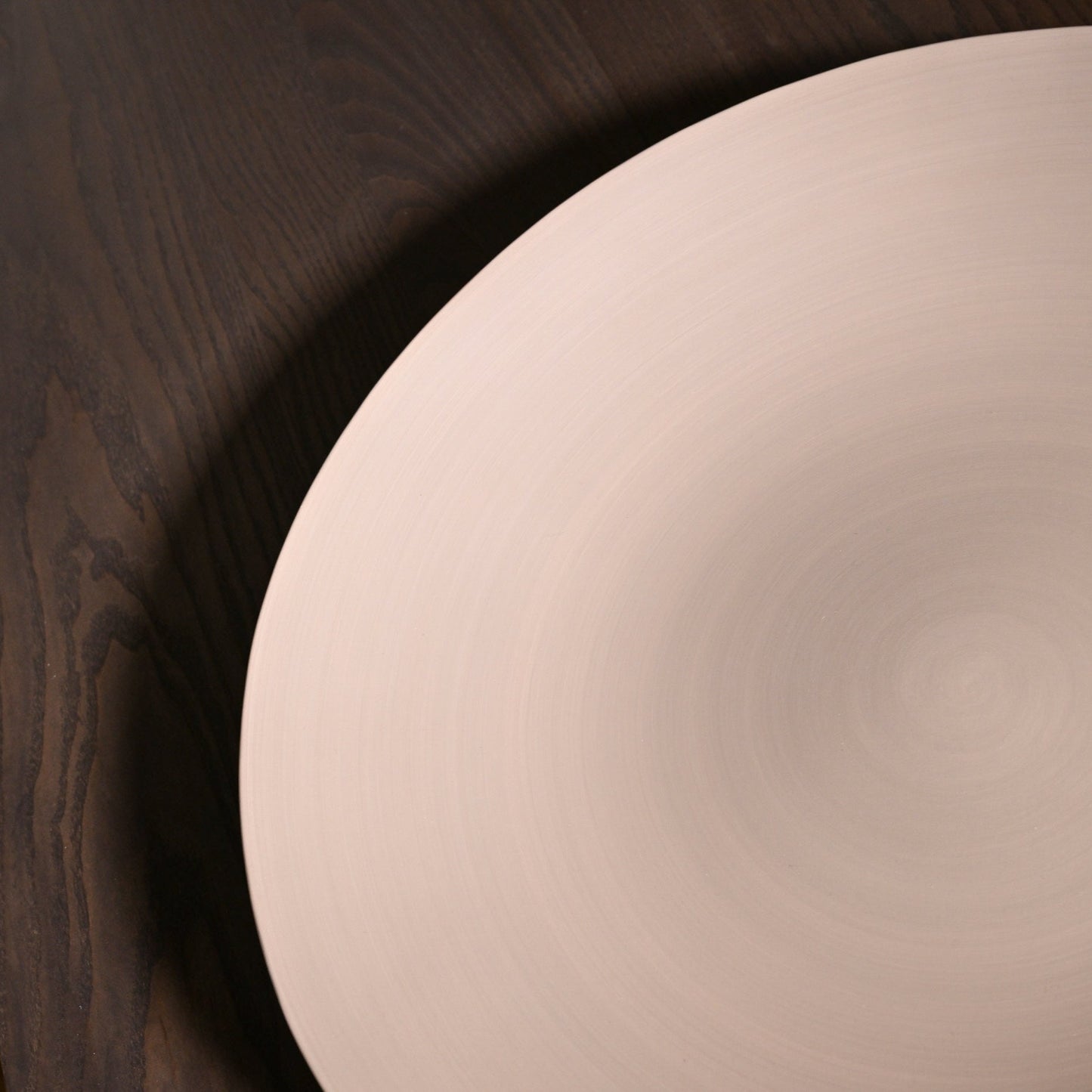 Shell plate large light brown minimalist off-white ceramic bowl with smooth glossy finish and subtle concentric ridges