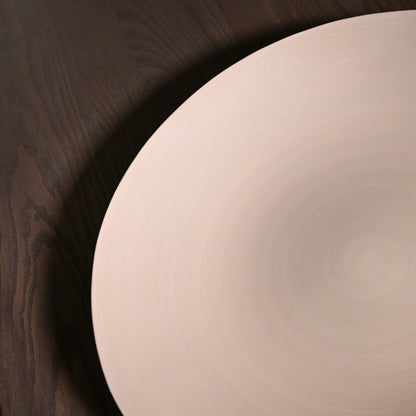 Shell plate large light brown minimalist off-white ceramic bowl with smooth glossy finish and subtle concentric ridges