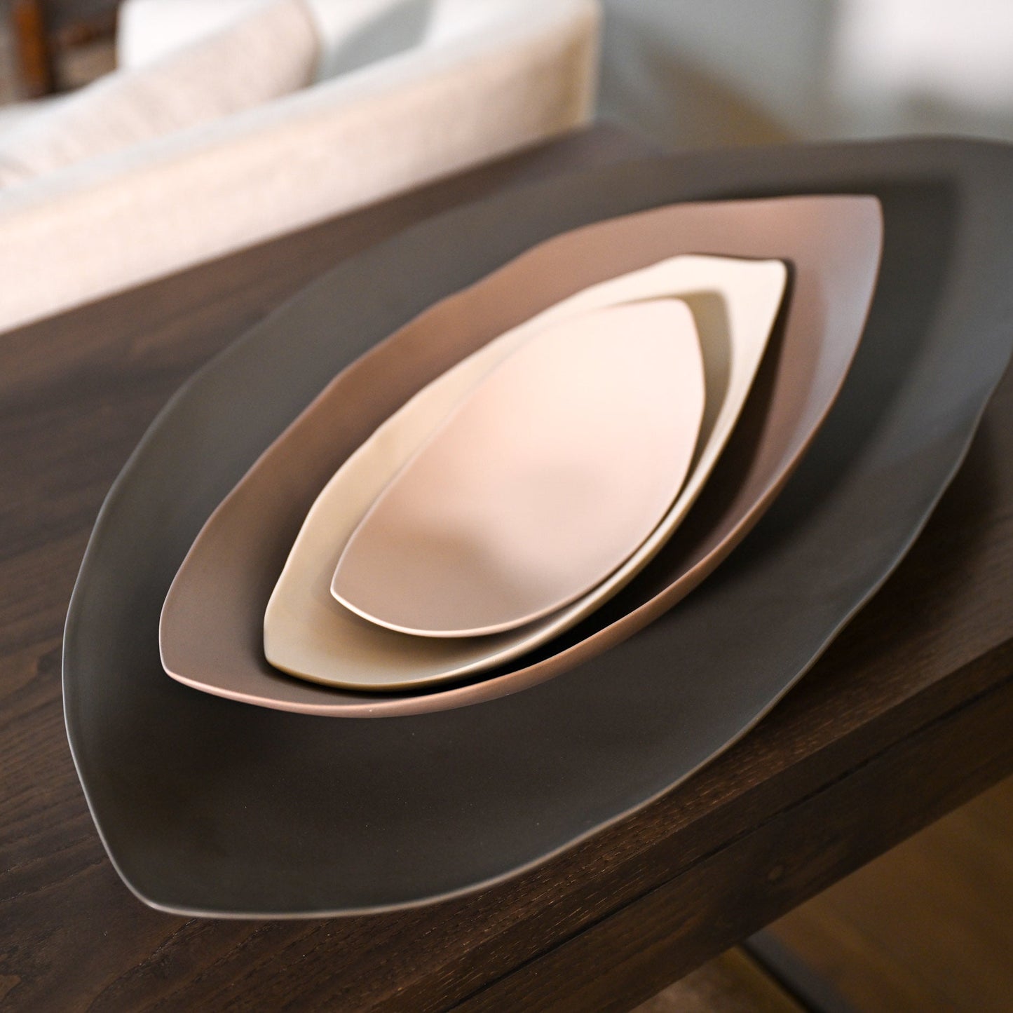 Set of three nested leaf-shaped ceramic serving plates in matte earth tones barchetta strette small turtledove