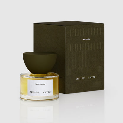 Maison d’etto fragrance macanudo perfume in a clear glass bottle with olive green cap and matching box