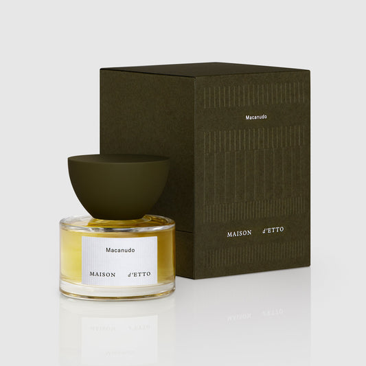 Maison d’etto fragrance macanudo perfume in a clear glass bottle with olive green cap and matching box