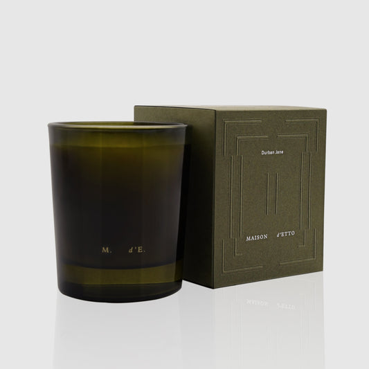 Maison detto candle durban jane olive-green glass candle with embossed branding in minimalist modern design