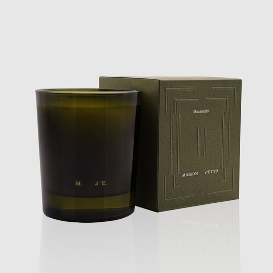 Olive-green glass Maison d’Etto candle Macanudo with minimalist modern design and embossed branding