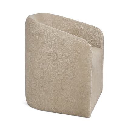 Beige leather Jolene slipcovered swivel bucket chair with textured slightly cracked surface and modern clean lines