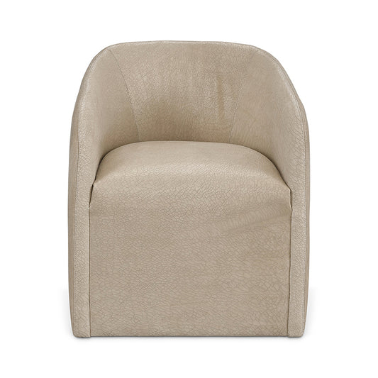 Beige faux leather Jolene slipcovered swivel bucket chair with soft textured surface and modern clean lines floor model
