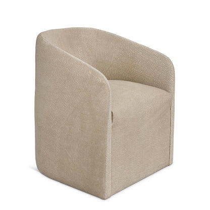 Beige faux leather jolene slipcovered swivel chair with soft textured surface and clean modern lines floor model