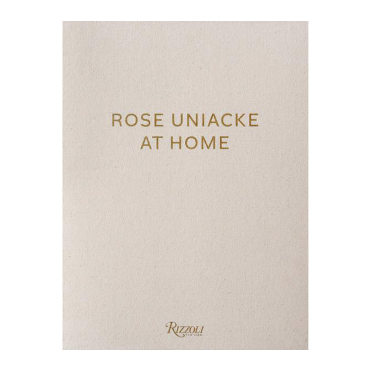 Beige book cover with 'Rose Uniacke At Home' and 'Rizzoli' in gold text