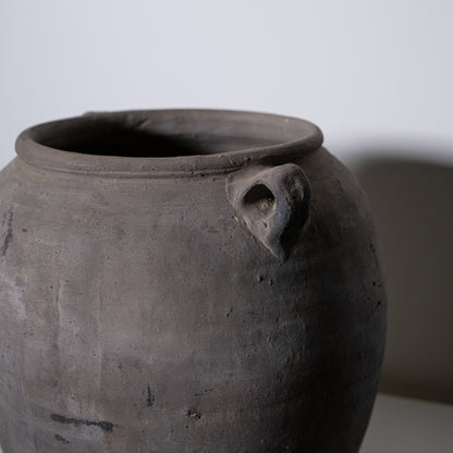 A close-up of a 19th Century Central European Clay Pot with a small handle near the rim, set against a plain background—an ideal antique decor item or vintage collectible for enthusiasts.