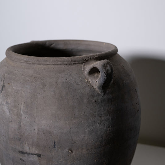 A close-up of a 19th Century Central European Clay Pot with a small handle near the rim, set against a plain background—an ideal antique decor item or vintage collectible for enthusiasts.