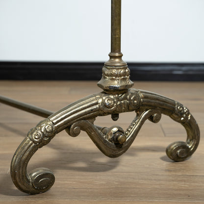 Decorative metal rack on a wooden floor.