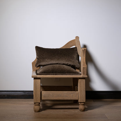 Carved wood corner stool with a rustic light oak frame and mohair seat featuring brown velvet cushions