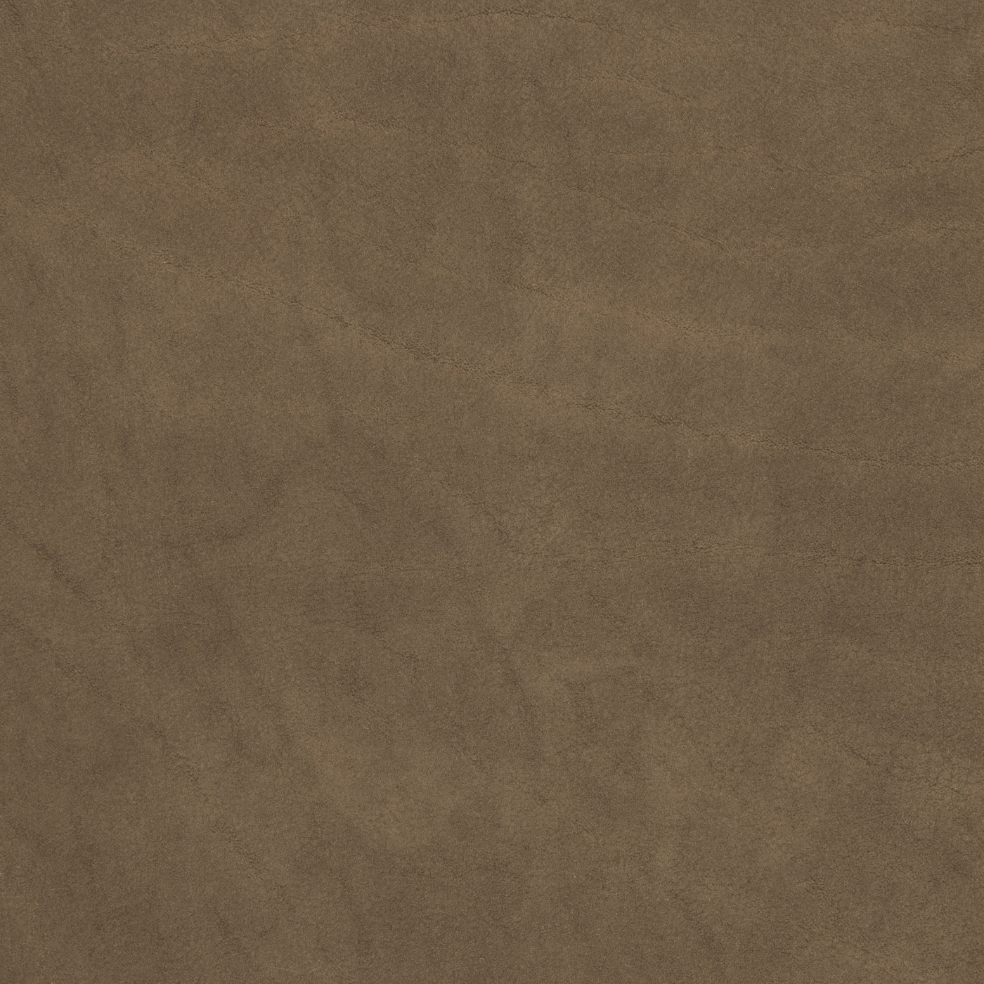 Brown leather surface with a subtle, textured finish.