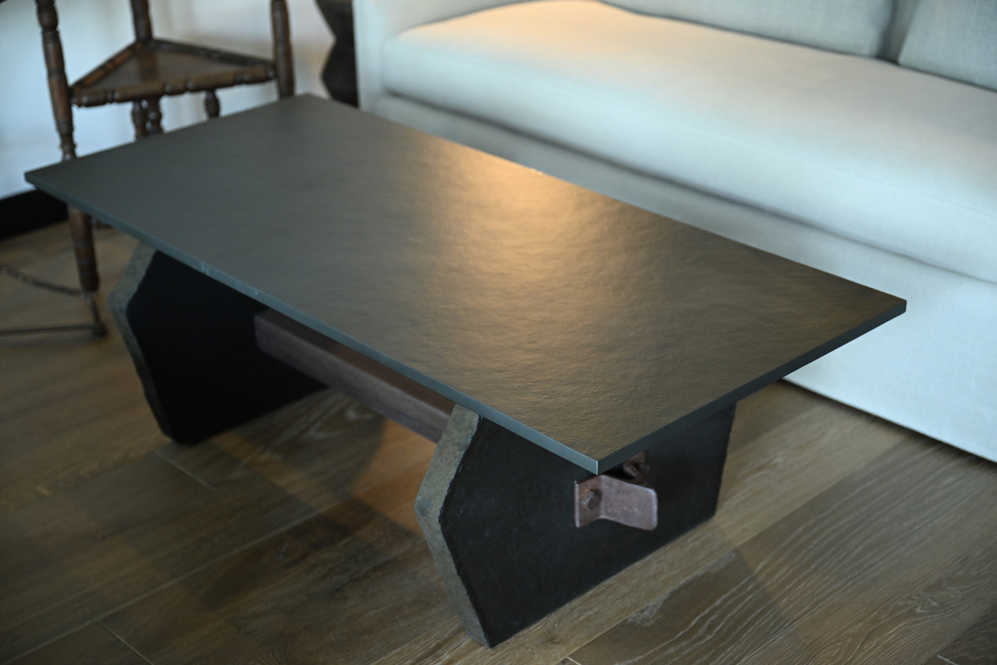 Blue stone cocktail table modern black coffee table with sleek minimalist design and angular legs