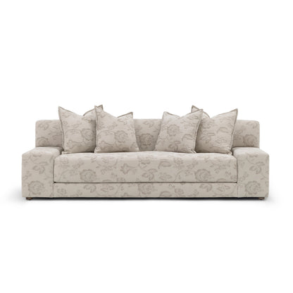 Custom order Esme sofa beige fabric with subtle floral pattern and matching throw pillows for stylish living room seating