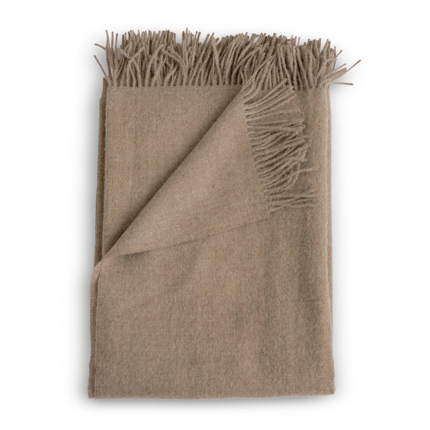 Beige alpaca throw blanket with soft textured weave and fringed edges in fawn color for cozy warmth
