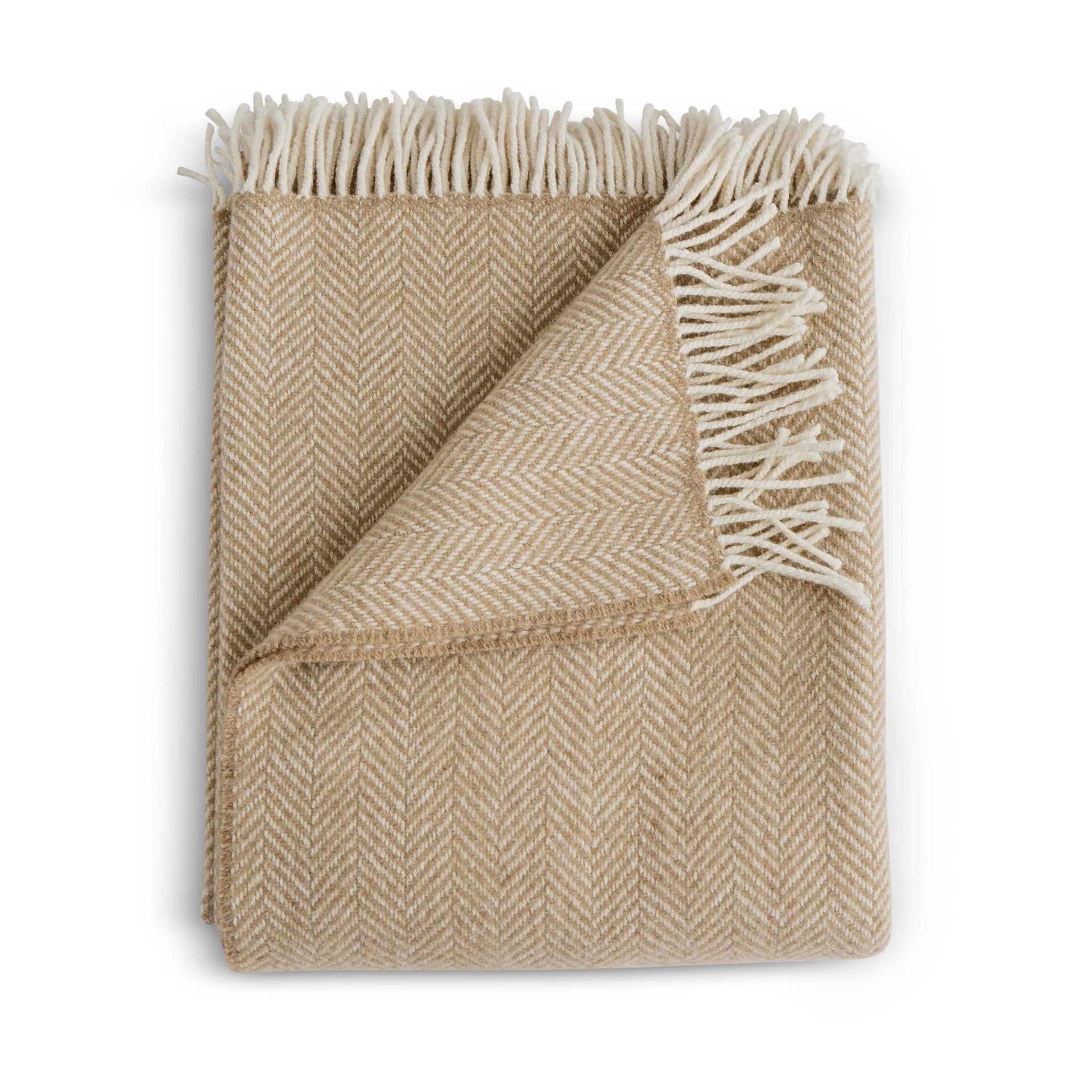 Beige wool herringbone throw blanket with cream-colored fringe perfect for cozy home decor in harvest color
