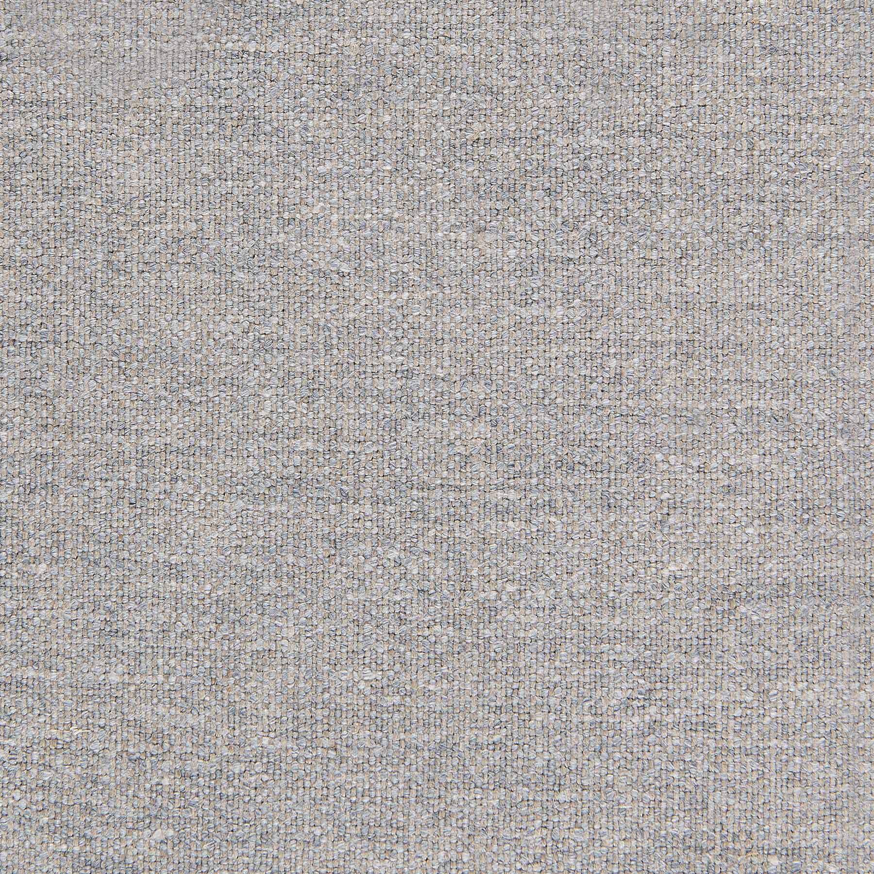 Gray textured fabric with a subtle woven pattern.