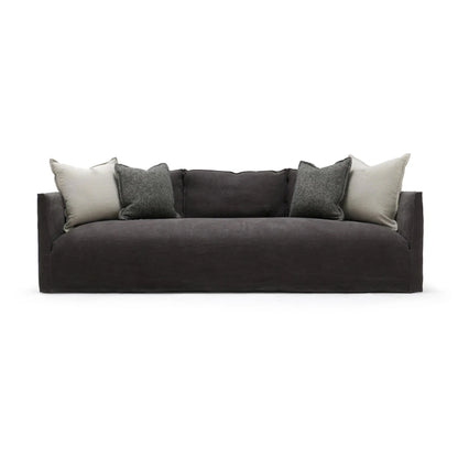 Gray sofa with contrast cushions on a white background