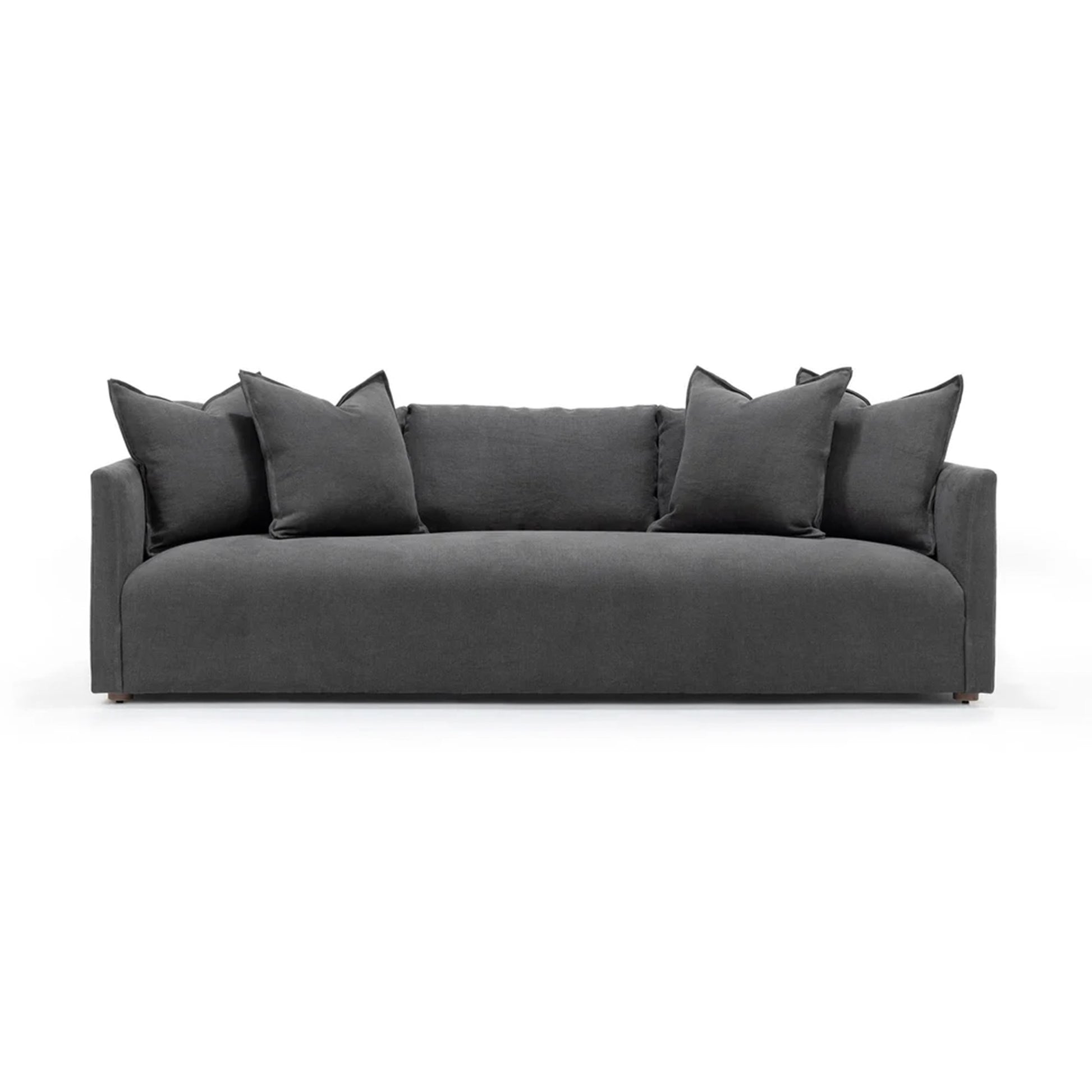 Gray sofa with decorative pillows on a white background