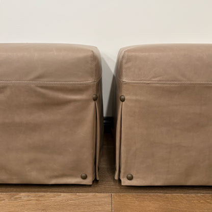 Custom order kim ottoman in tan leather with subtle stitching and brass toned studs at the corners