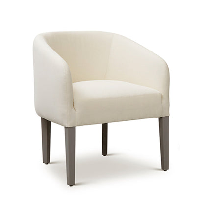 Cream-colored custom order Jolene swivel club chair with upholstered fabric and sleek tapered gray legs