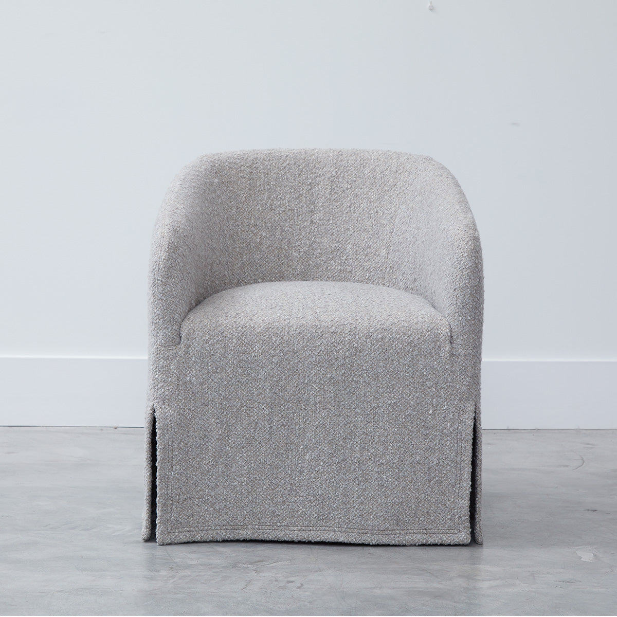 Custom order Jolene swivel club chair in light gray soft textured fabric with cozy curved lines