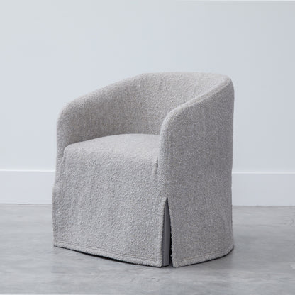 A cozy light gray custom order Jolene swivel club chair with soft textured fabric and modern design