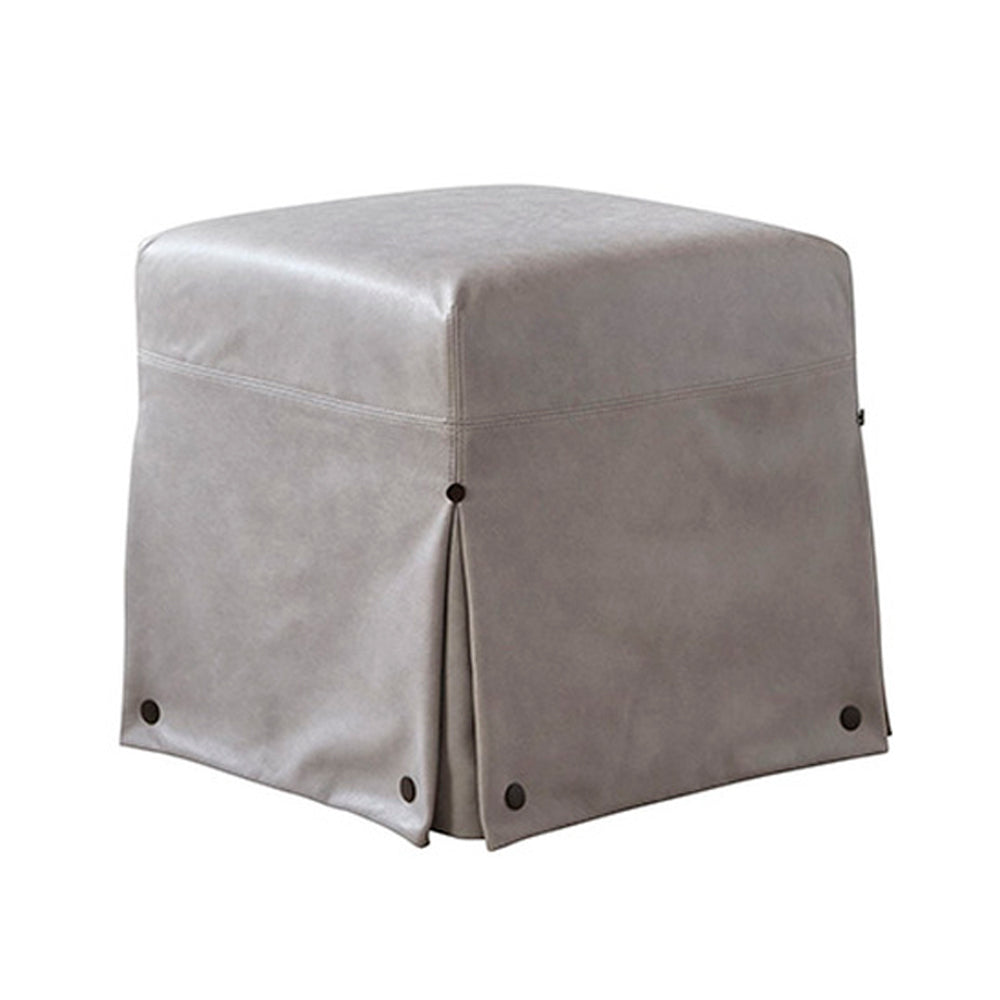 Gray faux leather custom order kim ottoman with skirted design and black button accents