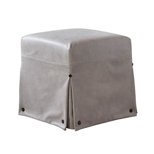 Gray faux leather custom order kim ottoman with skirted design and black button accents