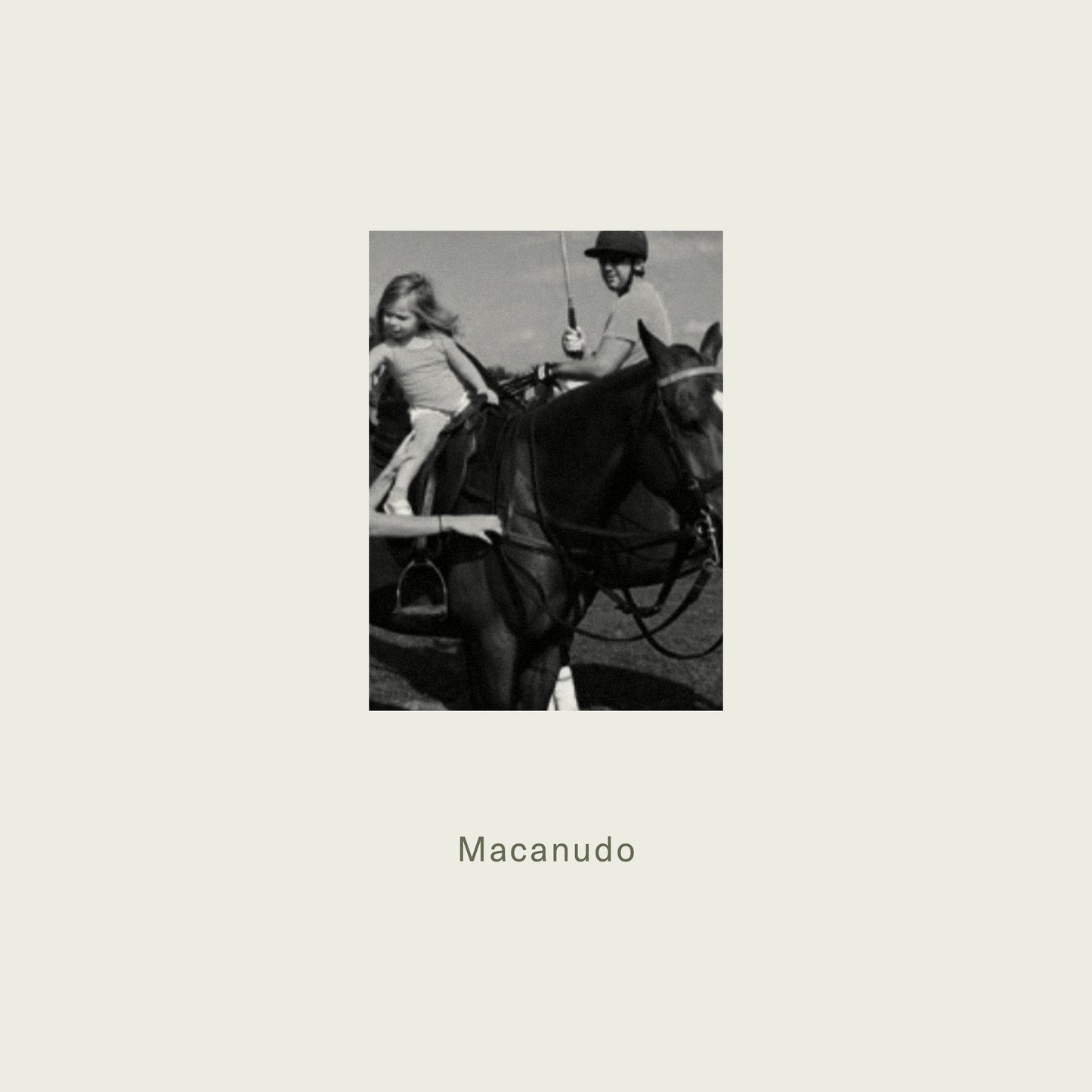 Black horse with rider and young girl in equestrian gear featured alongside maison detto candle macanudo product