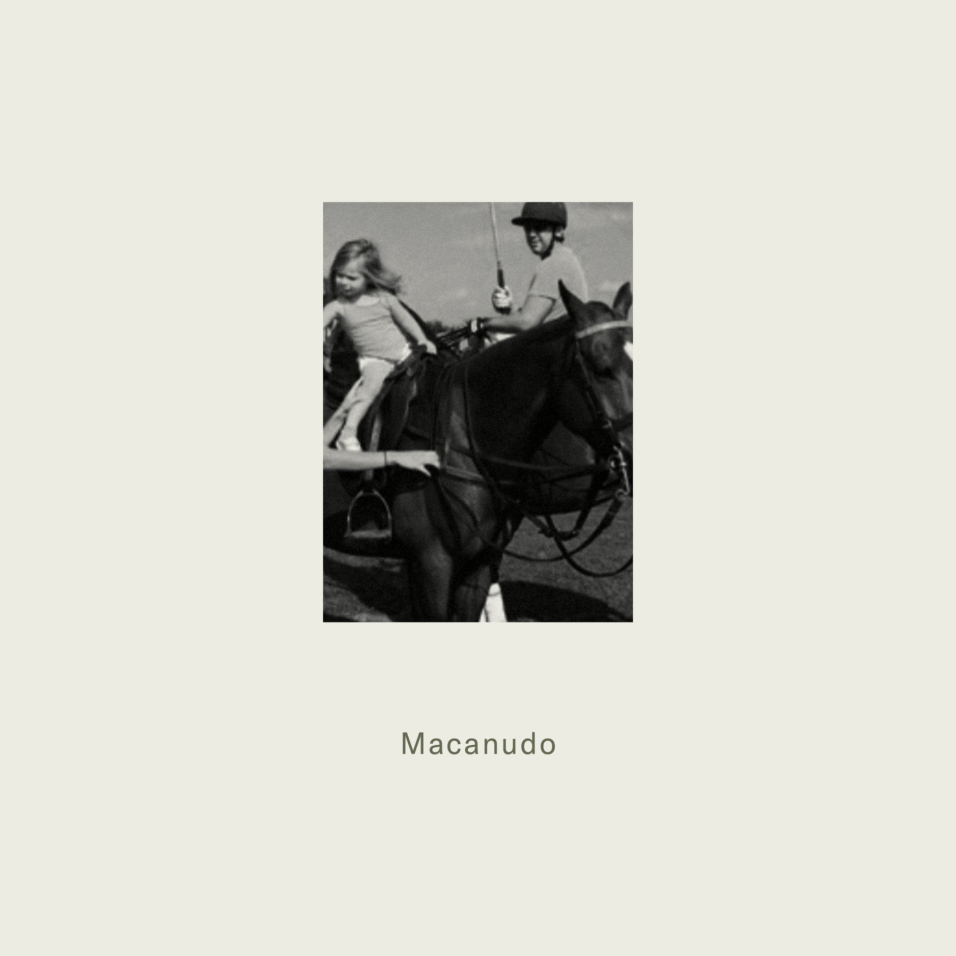 Black horse with rider and young girl in equestrian gear featured alongside maison detto candle macanudo product