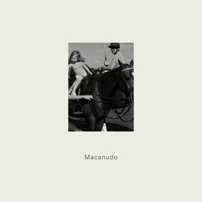 Black horse with rider and young girl in equestrian gear featured alongside maison detto candle macanudo product