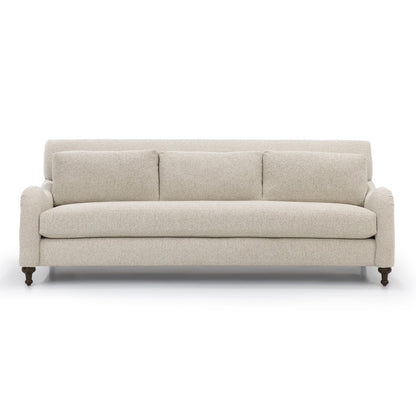 Custom order margot sofa beige upholstered with three seat cushions and dark wooden legs for comfortable seating