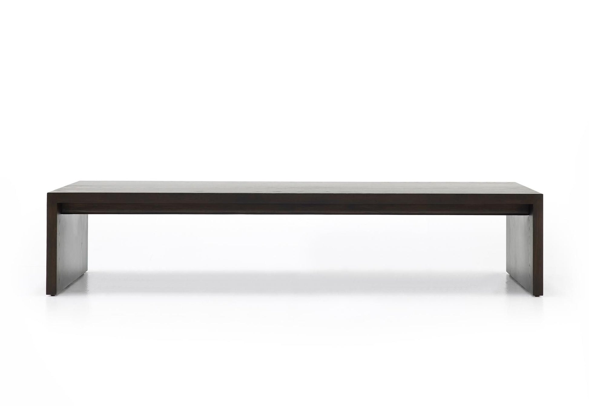 Menorca ash coffee table 60 inch floor model in dark wood with sleek minimalist design and clean lines