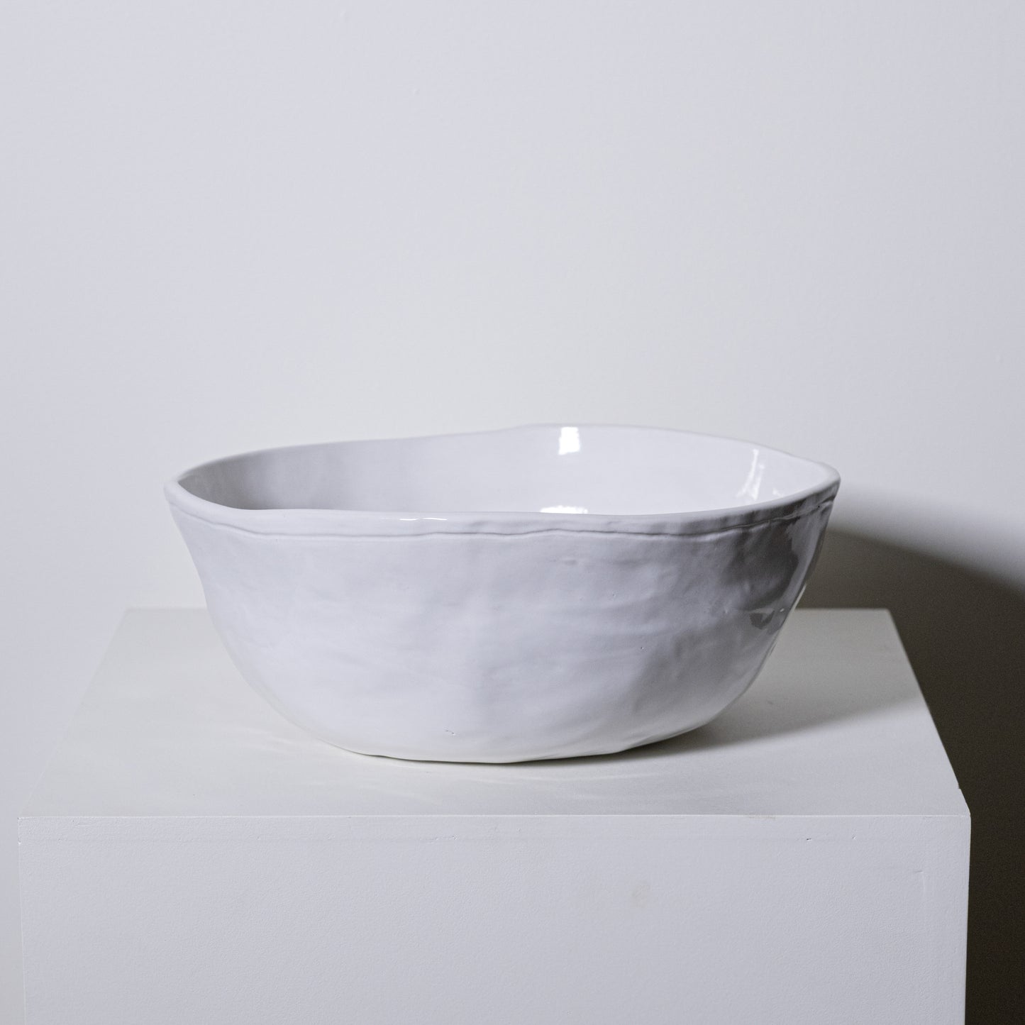 A white ceramic Magnolia Bowl No. 228 with a textured handcrafted surface and slightly irregular edges