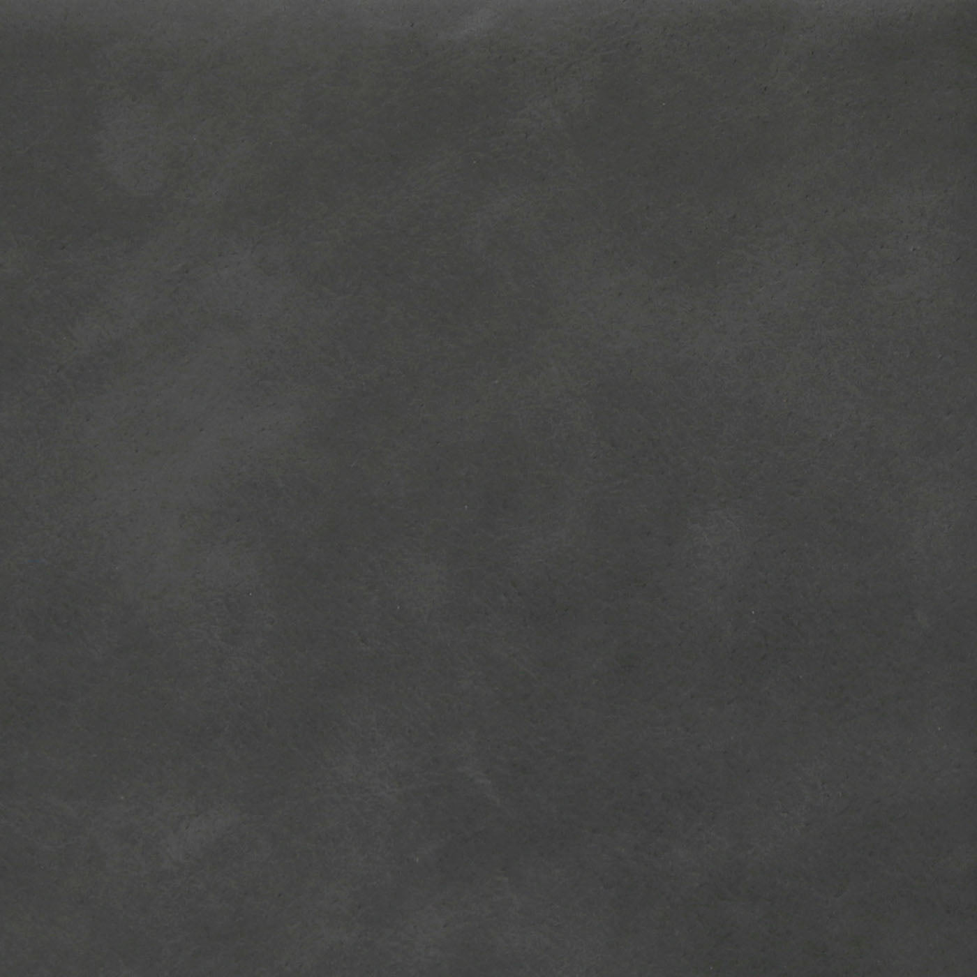 Dark gray textured tile with a matte finish.