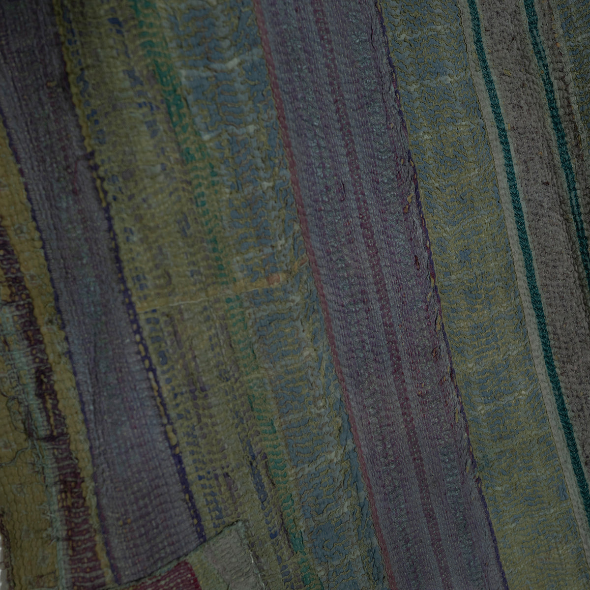 Woven quilt with vertical stripes in olive green, dark gray, and muted blue