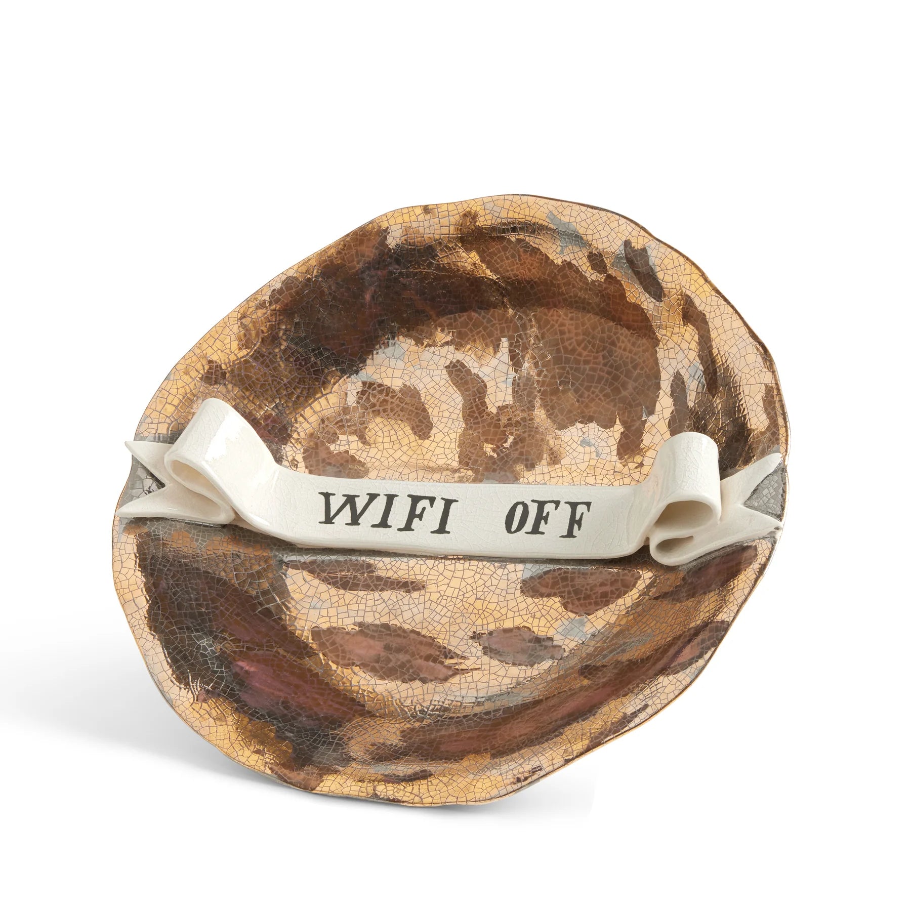 A ceramic ruan hoffman wifi off plate with crackled brown and gold glaze and a white ribbon band inscription