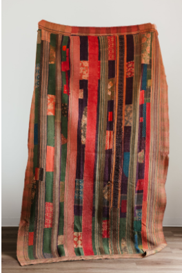 Scout quilt patchwork quilt with vertical stripes in rich reds greens blues and earthy tones for cozy use