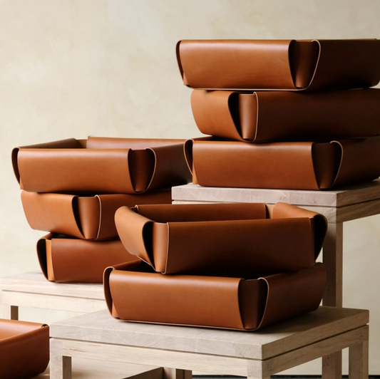 Brown leather assembly basket with sleek minimalist design for organized storage and assembly tasks