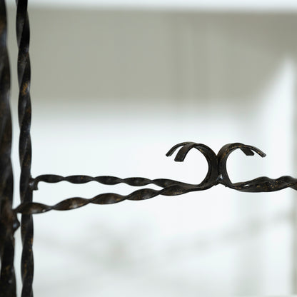 Close-up of barbed wire against a blurred background