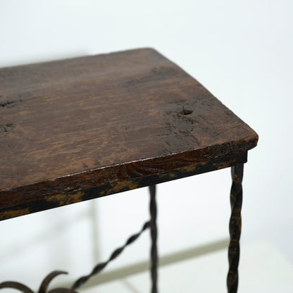 Close-up of a dark wooden table with a blurred background