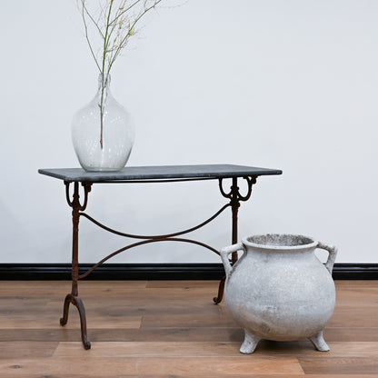 Demijohn rustic wrought iron console table with dark slate top and ornate curved legs perfect for entryways